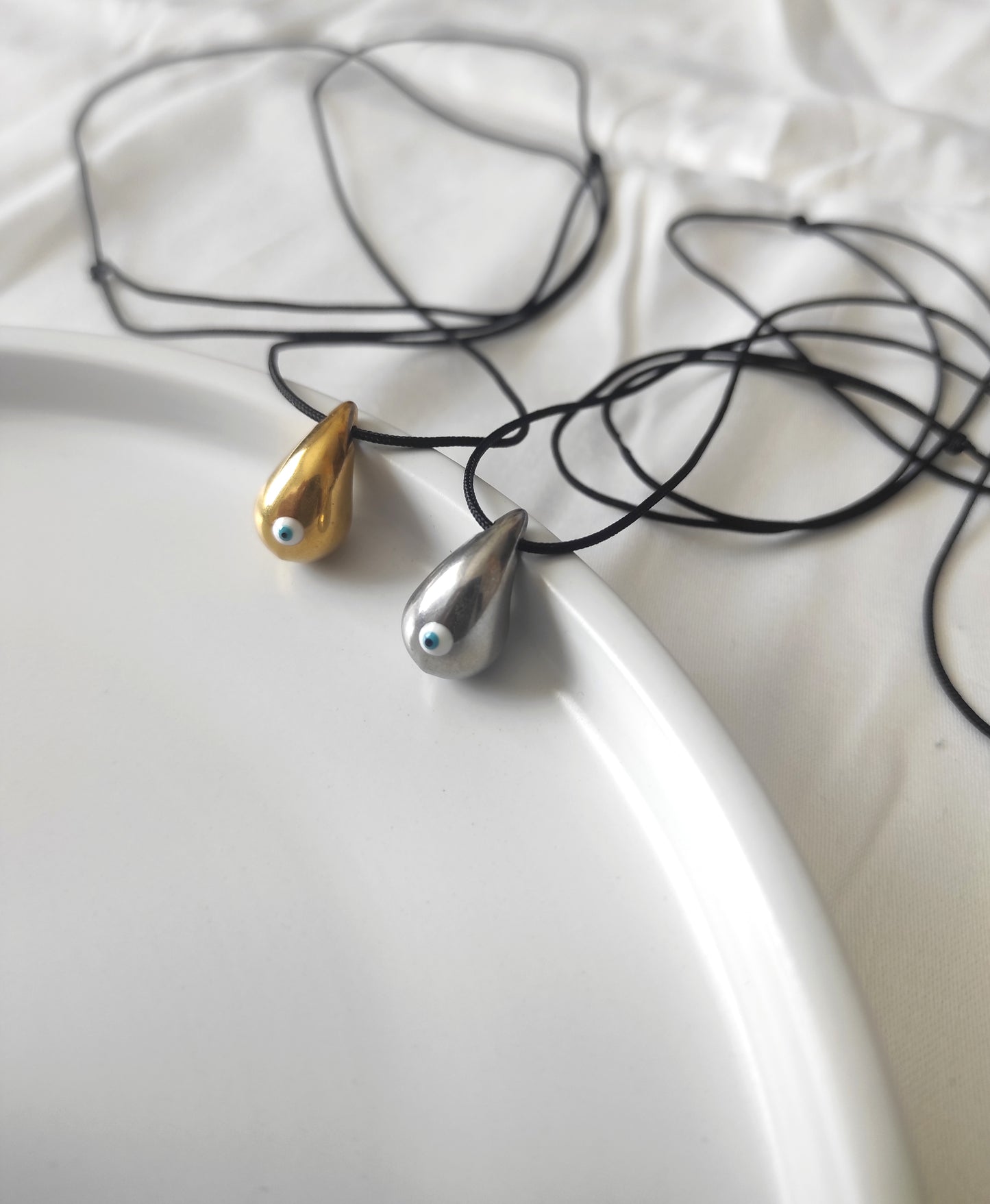 Eye drop necklace