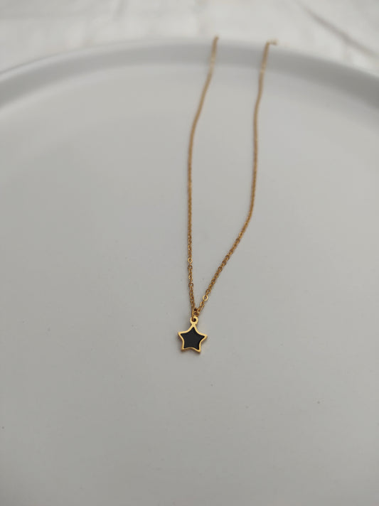 Mini black star necklace