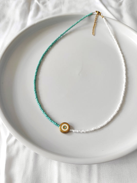 Green eye necklace